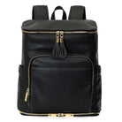 A black leather baby bag backpack with gold zippers on white background