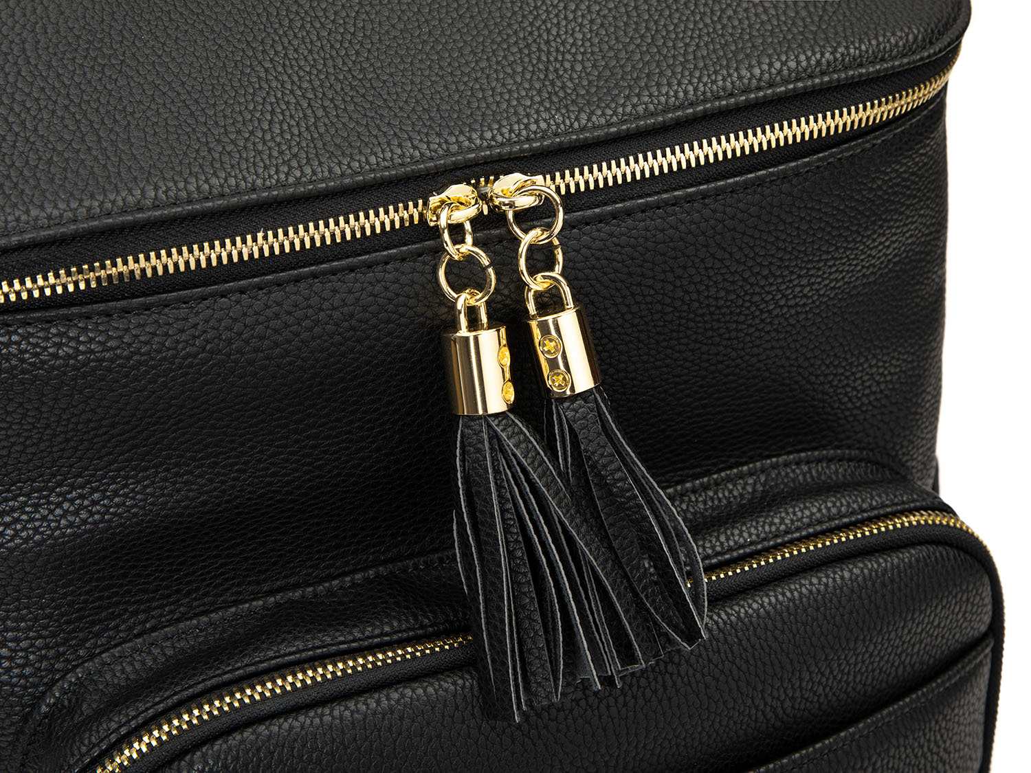 Close-up shot of the black tassel with gold hardware on a black leather nappy backpack with a gold zipper from Tottie