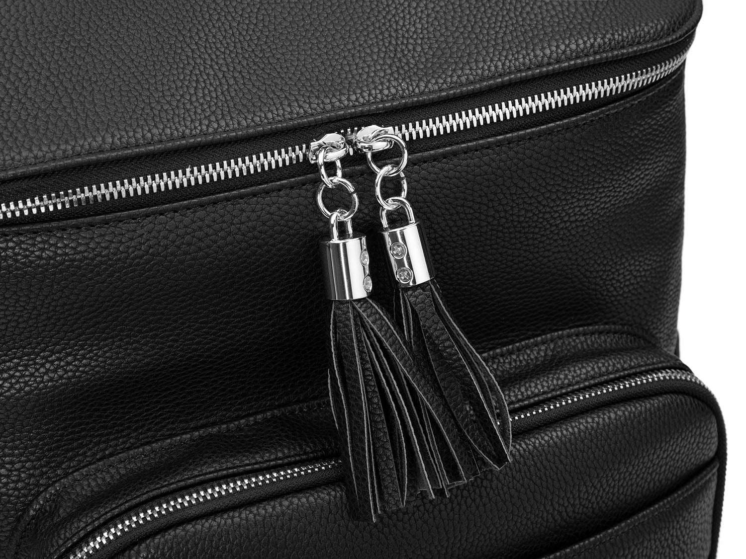 Close-up view of the black tassel with silver hardware on a black leather nappy backpack with a silver zipper from Tottie