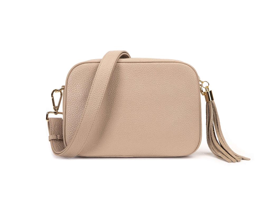 Stone-Colored Leather Crossbody Bag with Gold Hardware, Chain Strap, and Tassel from Tottie