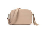 stone colored leather crossbody bag in white background