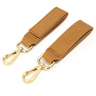 tan colour leather pram clip with gold buckle clip from Tottie